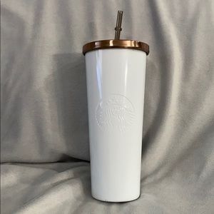 White Starbucks tumbler with rose gold lid